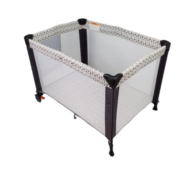 Aussie travel cot folded for air travel with a baby